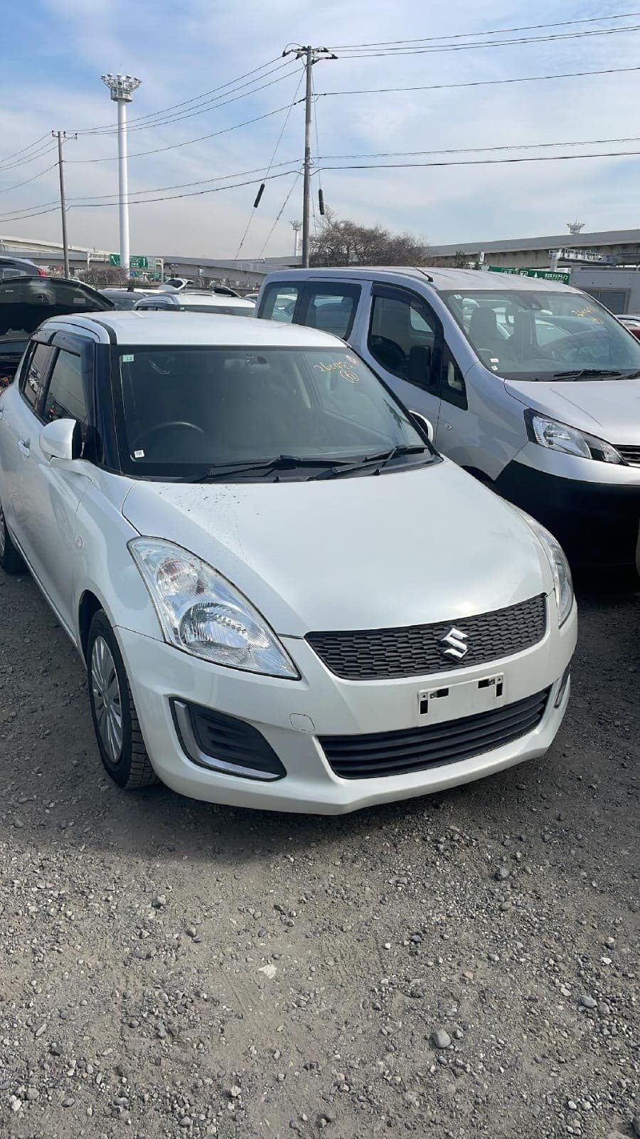 Economy — Suzuki Swift — white